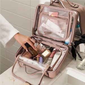 Calpak mauve cosmetic bag